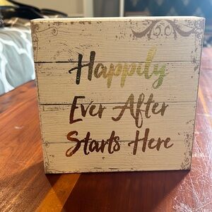 “Happily Ever After Starts Here” home decor sign